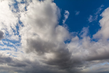 The sky covered with gray, heavy clouds.
