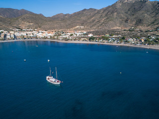 Aerial view photo of Luxury vintage two masted tourist trip ship stays on anchor in the bay, calm transparent water of mediterranean sea near Cartagena, Costa Blanca, Spain 2