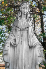 Obraz na płótnie Canvas Virgin Mary Statue with open arms