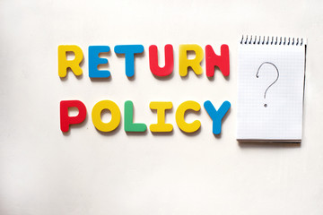 Conceptual colored words Return Policy on white wooden background . Business photo text. Place for text