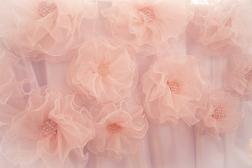 pink tulle flowers, holiday decoration. The cloth. The decor. Background