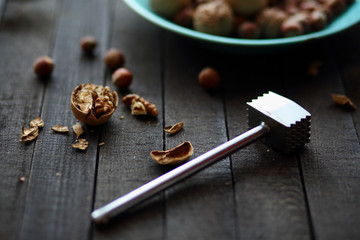 walnuts and hazelnuts on dark wooden background