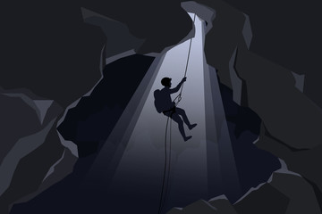 Rescuers or climber fast rope in the dark caves.