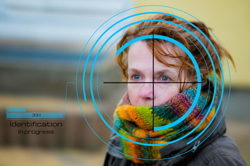 Identification in progress - a woman is identified by a surveillance camera