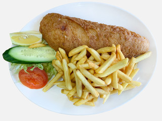 Fish and chips on a plate isolated on white. Traditional British meal. Top view.
