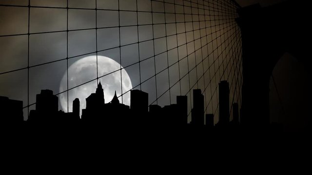 New York: Famous Skyline of Downtown from Brooklin Bridge by Night with Full Moon, Manhattan, New York City, USA