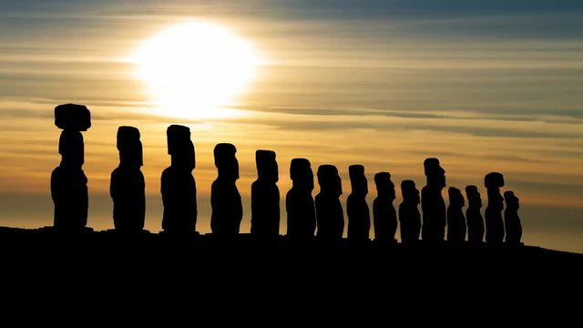 Moai, the Ancient and Mysterious Sculpture at Sunset, Time lapse with Sun and Clouds, Easter island, Polynesia, Chile