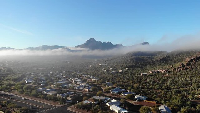 Clouds through Twin Peaks Mountains in Arizona
