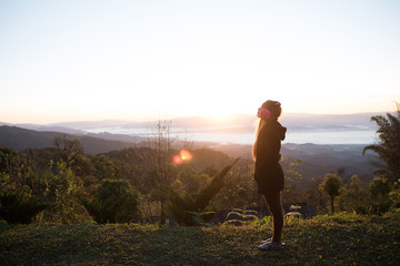 Woman wake up relax in morning on th mountain