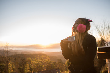 Woman wake up relax in morning on th mountain