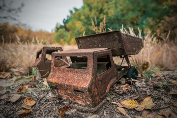 Forgotten and rusty children's toys are contaminated by radiation and thrown out forever