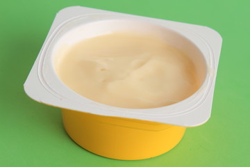 custard packed in plastic container