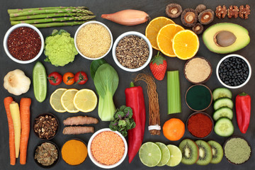 Diet health food for liver detox concept with fresh fruit, vegetables, herbal medicine, legumes, grains, seeds, herbs and spices. Foods high in antioxidants, omega 3, vitamins &  dietary fibre.    