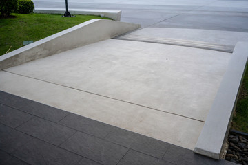 Wide ramped access, using wheelchair ramp for disabled people.