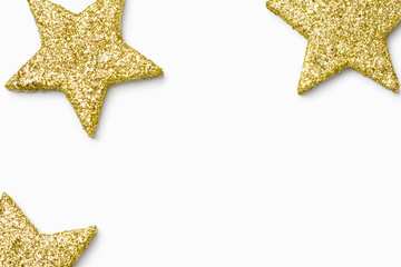 Minimalist Christmas New Year poster banner card template. Golden decorative stars on white background. Flat lay. Copy space for text lettering