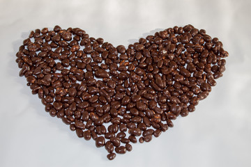 A big heart made of raisins in chocolate