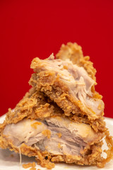Crispy fried chicken kentucky with red background.