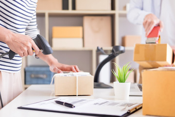 Businessman Shop owner check Order or list inventory in stock which is going to be delivery room. business online, e-commerce concept.