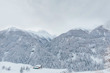 Fototapeta na wymiar Snowy mountain landscape of Switzerland