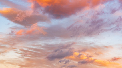 Naklejka na ściany i meble Sunset with dramatic sky and colorful clouds