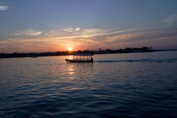 Fototapeta na wymiar Sunset over a lake