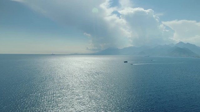 Sea Ships Mountains and Clouds Aerial View