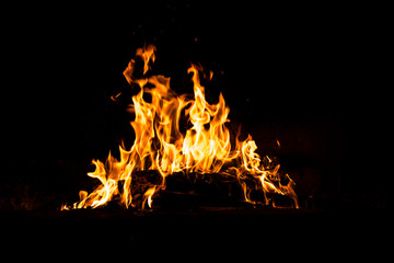 Fire flames burning isolated on black background. High resolution wood fire flames collection smoke...