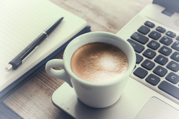 Coffee cup workspace laptop notebook pen