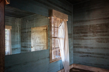 abandoned house living room window light