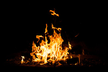 Fire flames burning isolated on black background. High resolution wood fire flames collection smoke texture background concept image.
