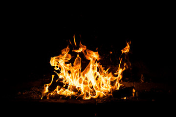 Fire flames burning isolated on black background. High resolution wood fire flames collection smoke texture background concept image.