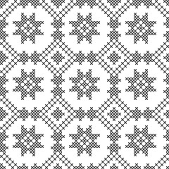 Fototapeta premium Cross stitch, seamless decorative pattern. Embroidery and knitting. Abstract geometric background. Ethnic ornaments.