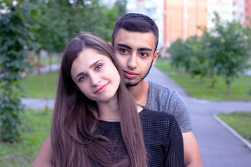 Fototapeta premium Sweet lovers posing in park