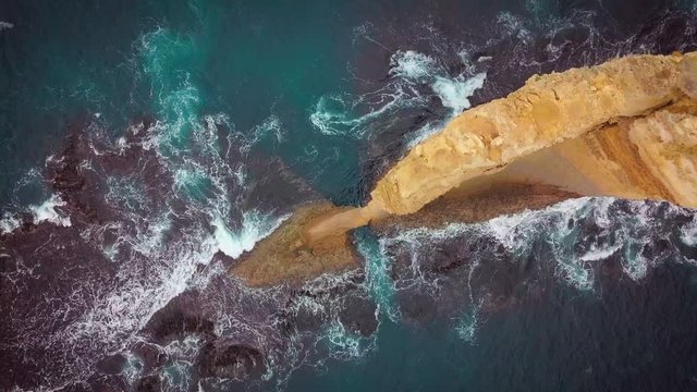 Aerial view of Loch Ard Gorge beach in Twelve Apostles marine park on Shipwreck coast of Victoria, Australia.