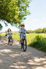 Obraz premium Urban biking - kids riding bikes 