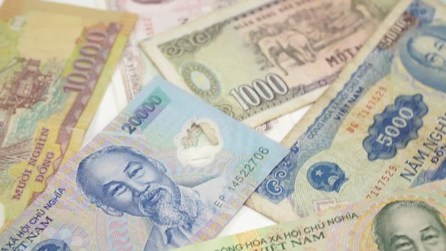 Old and new Vietnamese paper money. 4K