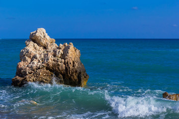 background blurred, view of the Aphrodite rock near the shore, where it emerged from the water, in the vicinity of Paphos, Cyprus