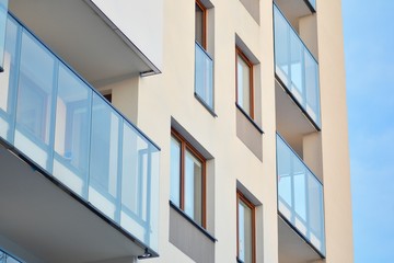 Fototapeta premium Abstract fragment of contemporary architecture, walls made of glass and concrete.