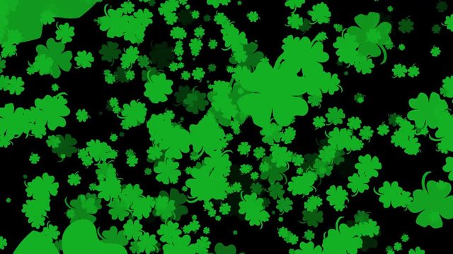 Green four leaf clover shamrocks on black seamless looping motion background