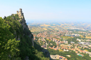 Fototapeta na wymiar Scenic view of Guaita fortress on Monte Titano with view to San Marino city, Italy.