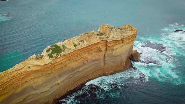 Aerial view of Loch Ard Gorge beach in Twelve Apostles marine park on Shipwreck coast of Victoria, Australia.