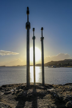 Three iron swords in a rock, sverd i fjell during sunset, Stavanger, Norway