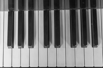 Fototapeta premium piano keys on black background