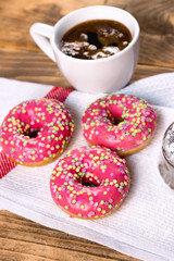 A break for pleasure - donut and coffee, American donuts and black coffee
