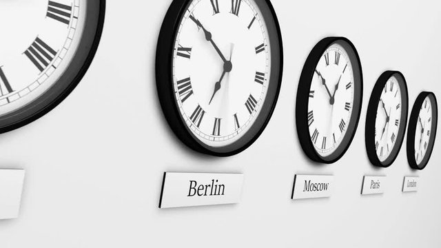 Clocks with different international time zones isolated on white