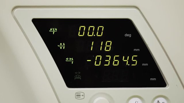 Close up PET or CT scanner in work. Display with numbers and values. Close Up machine read out and buttons