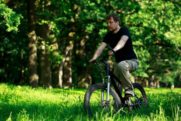 Naklejka premium Young guy on bike