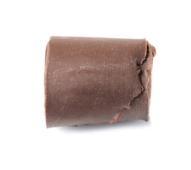 Yummy chocolate curl for decor on white background
