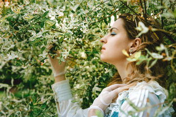 Beautiful woman in vintage dress. Spring green. Victorian lady. Elegant