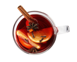 Glass cup of mulled wine isolated on white, top view
